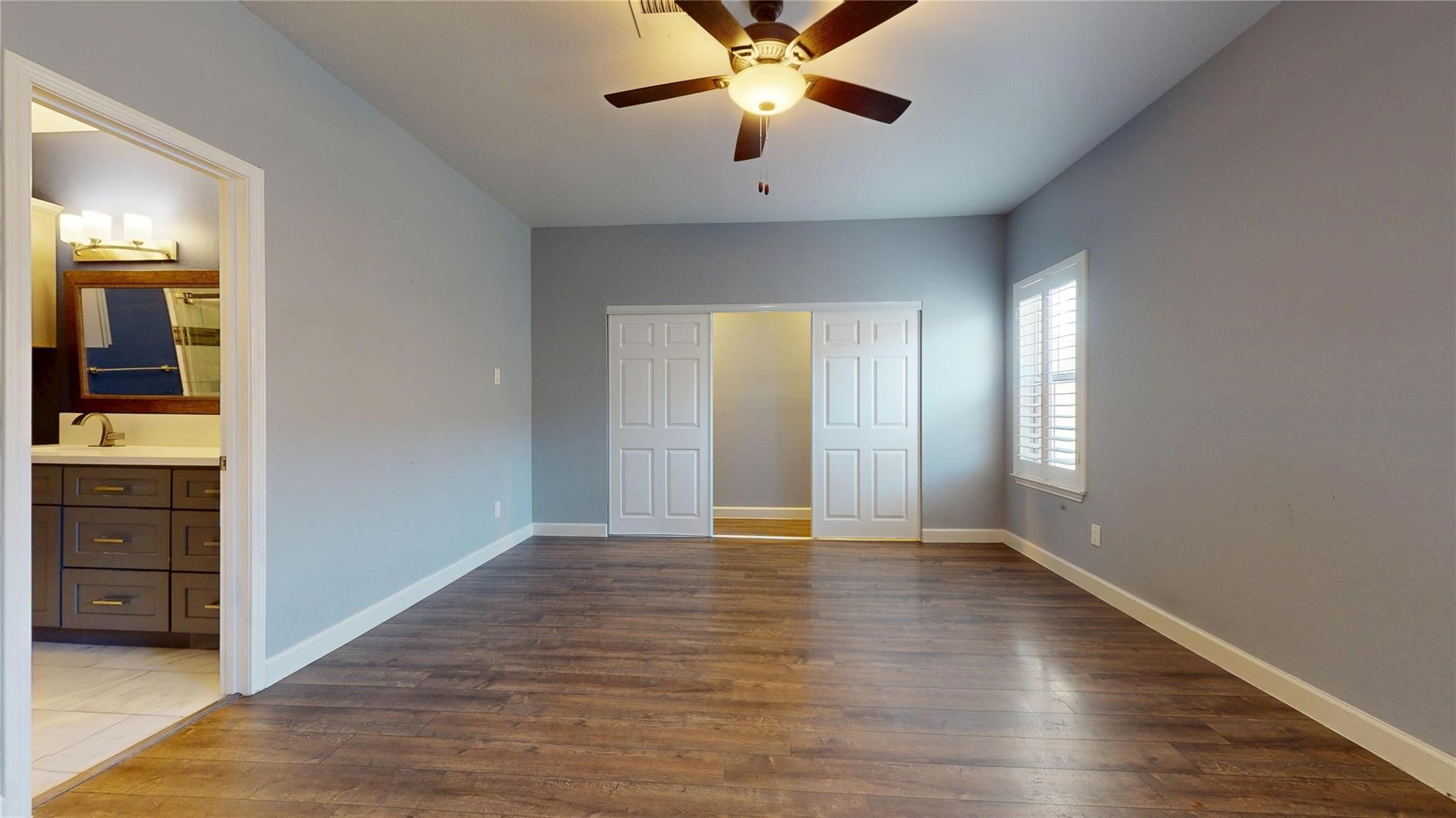 2984 Holly Hall Street Houston, TX 77054 - Photo 17 of 23 wooden floor in an empty room with a window