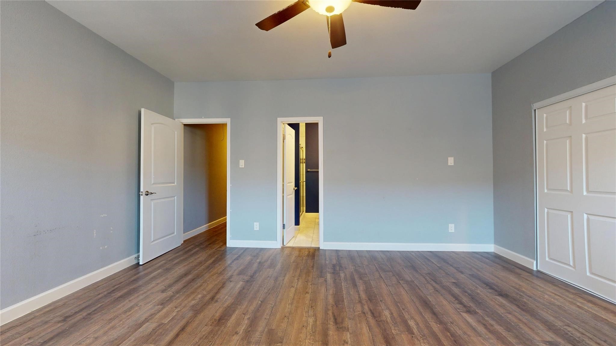 2984 Holly Hall Street Houston, TX 77054 - Photo 18 of 23 an empty room with closet and wooden floor
