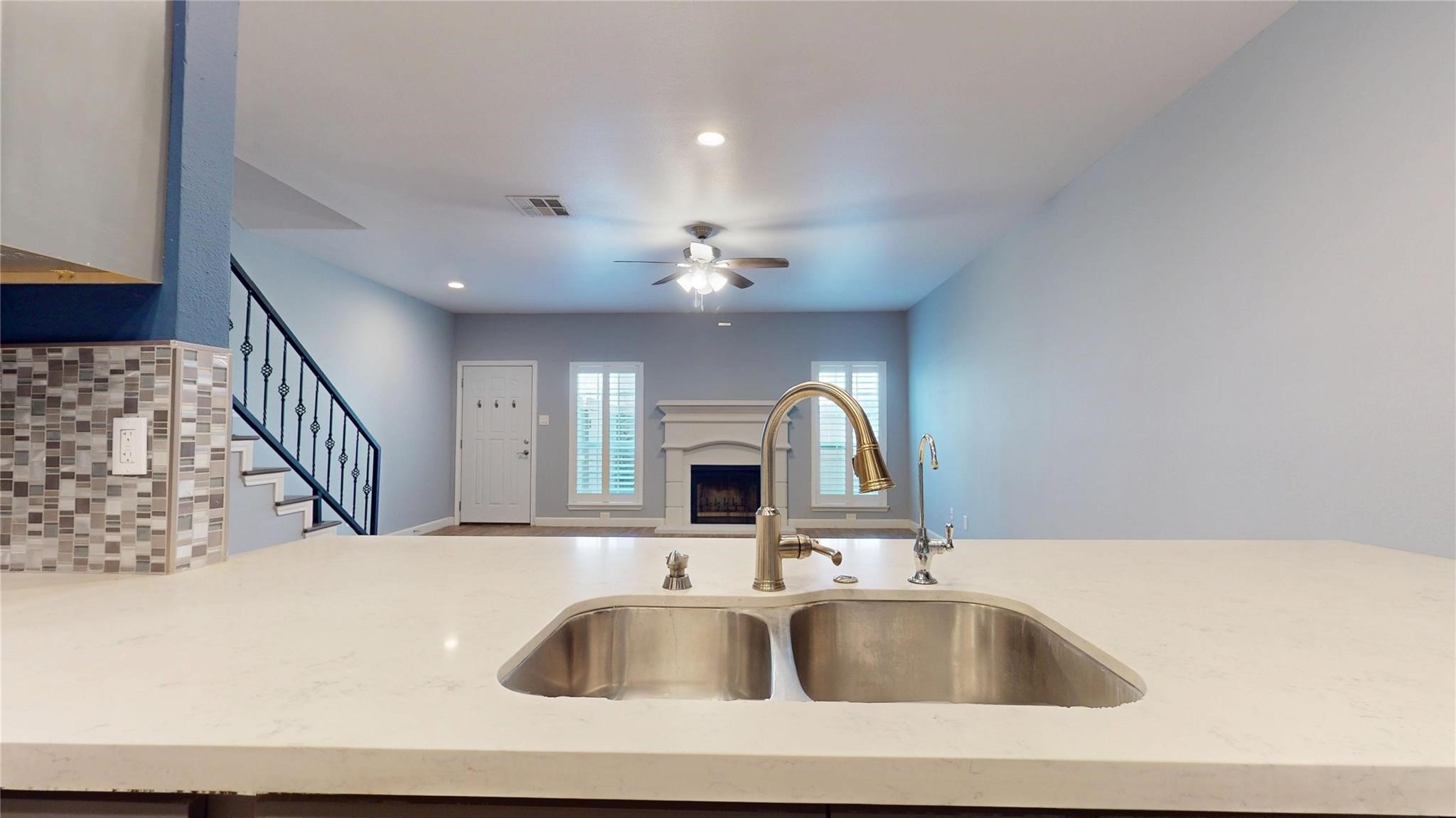 2984 Holly Hall Street Houston, TX 77054 - Photo 8 of 23 a view of kitchen sink with microwave and window