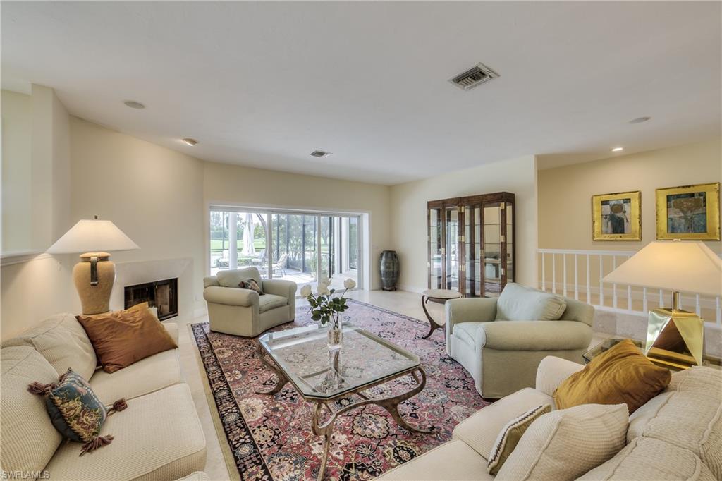 2260 Imperial Golf Course Boulevard Naples, FL 34110 - Photo 6 of 29 a living room with furniture or couch and a window