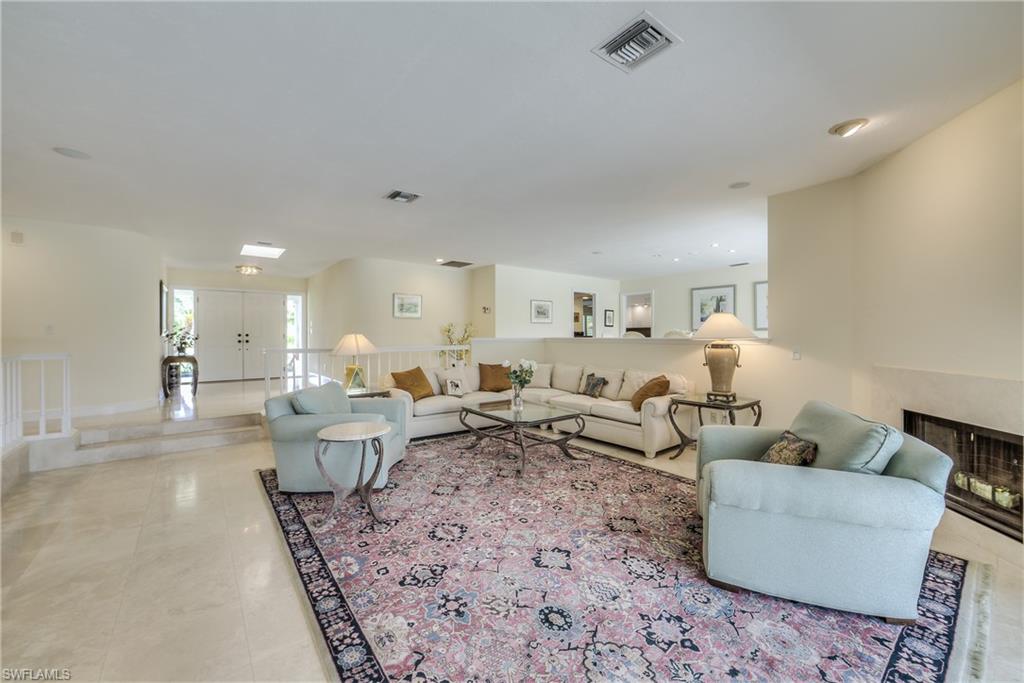 2260 Imperial Golf Course Boulevard Naples, FL 34110 - Photo 7 of 29 a living room with furniture