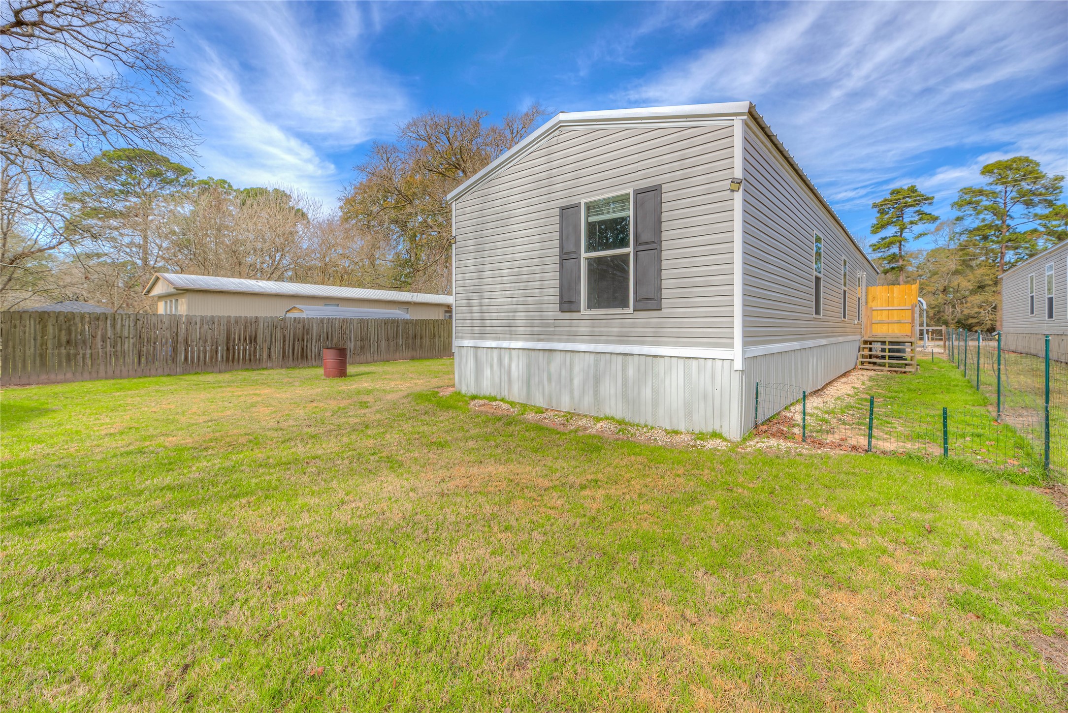 138 Pecan Onalaska, TX 77360 - Photo 19 of 33 a view of a house with a backyard