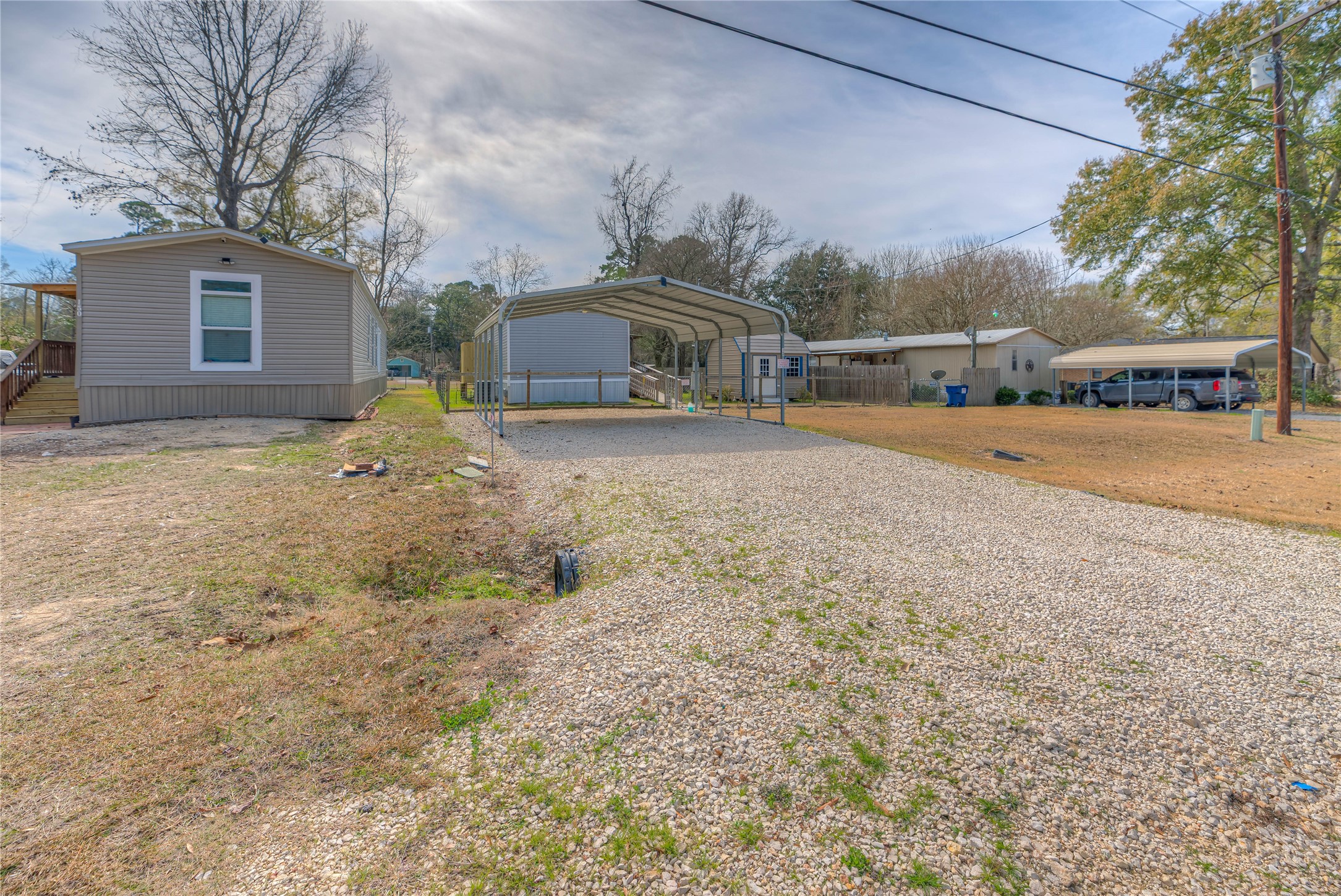 138 Pecan Onalaska, TX 77360 - Photo 22 of 33 a house with trees in the background