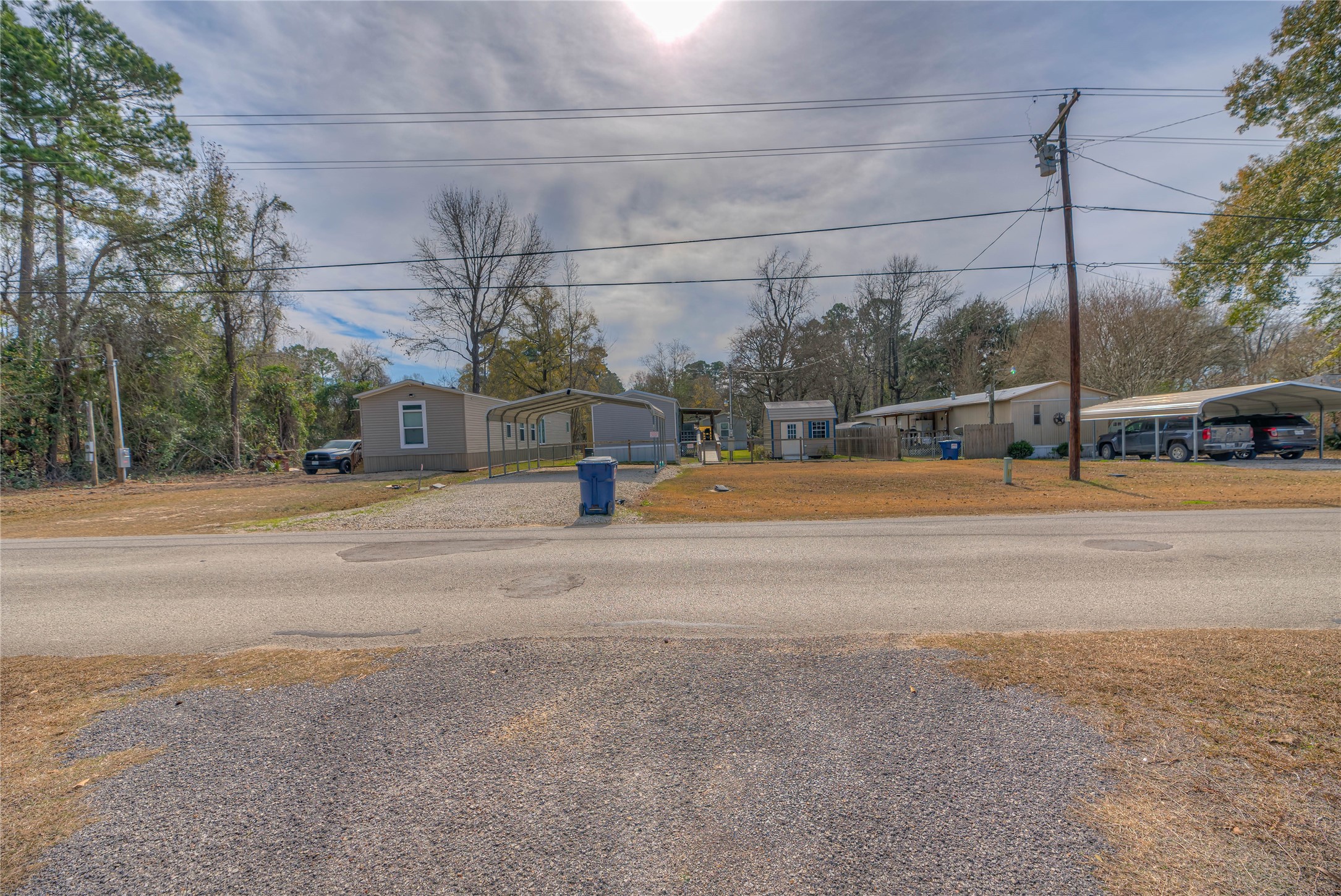 138 Pecan Onalaska, TX 77360 - Photo 25 of 33 a view of a road with a building in the background