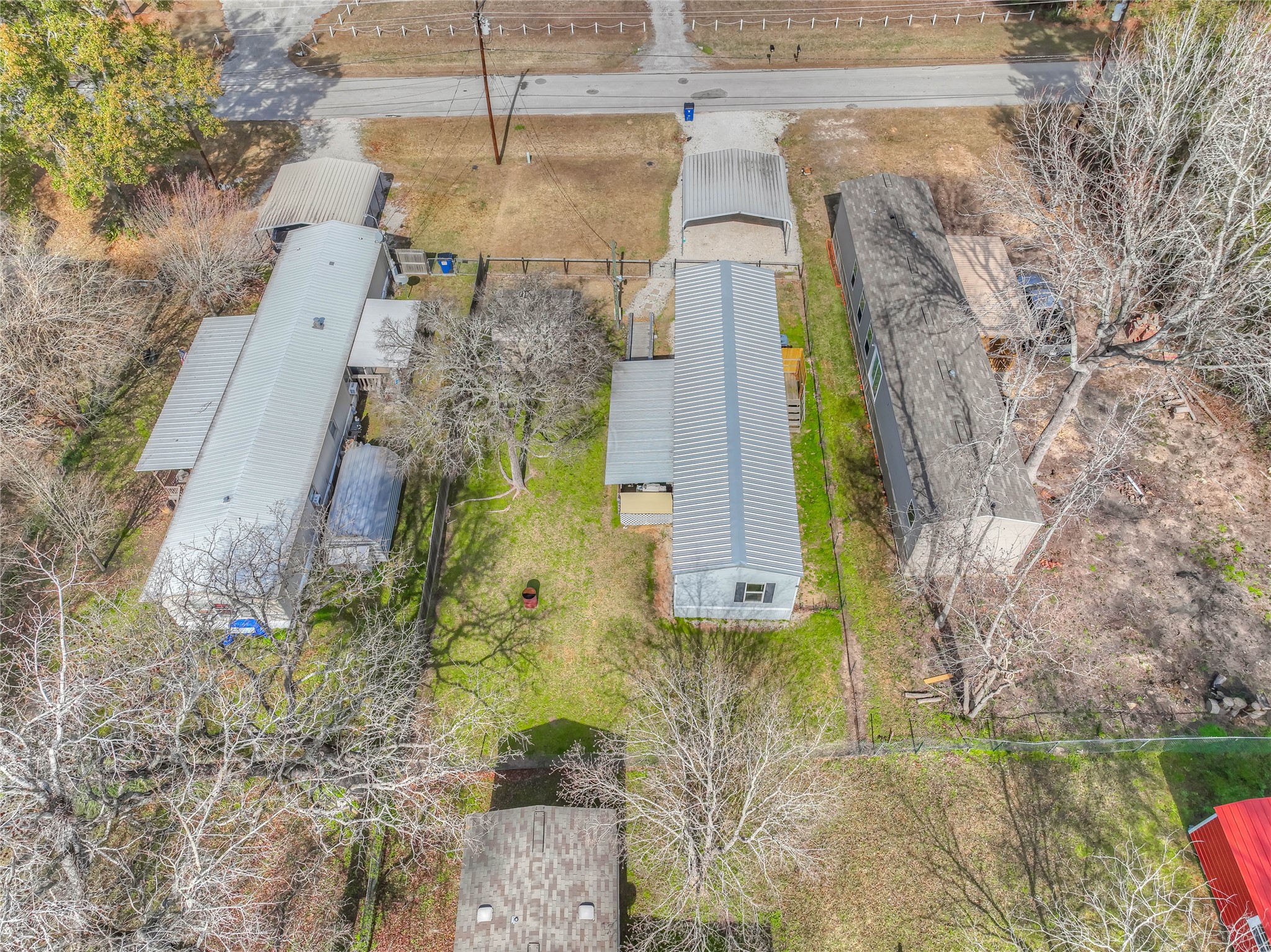 138 Pecan Onalaska, TX 77360 - Photo 29 of 33 a aerial view of a house with a yard