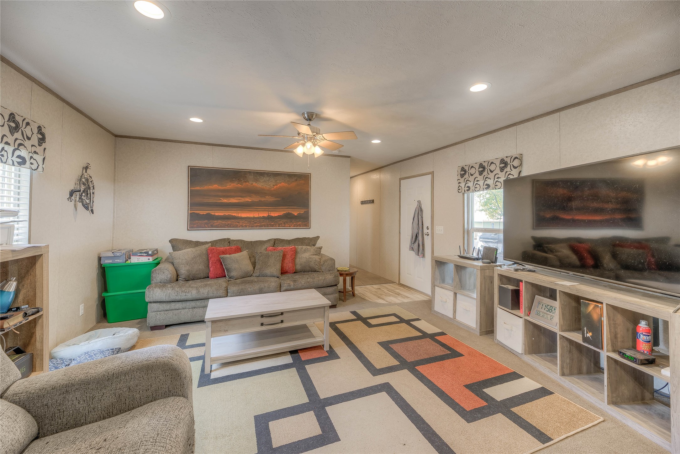 138 Pecan Onalaska, TX 77360 - Photo 3 of 33 a living room with furniture and a flat screen tv