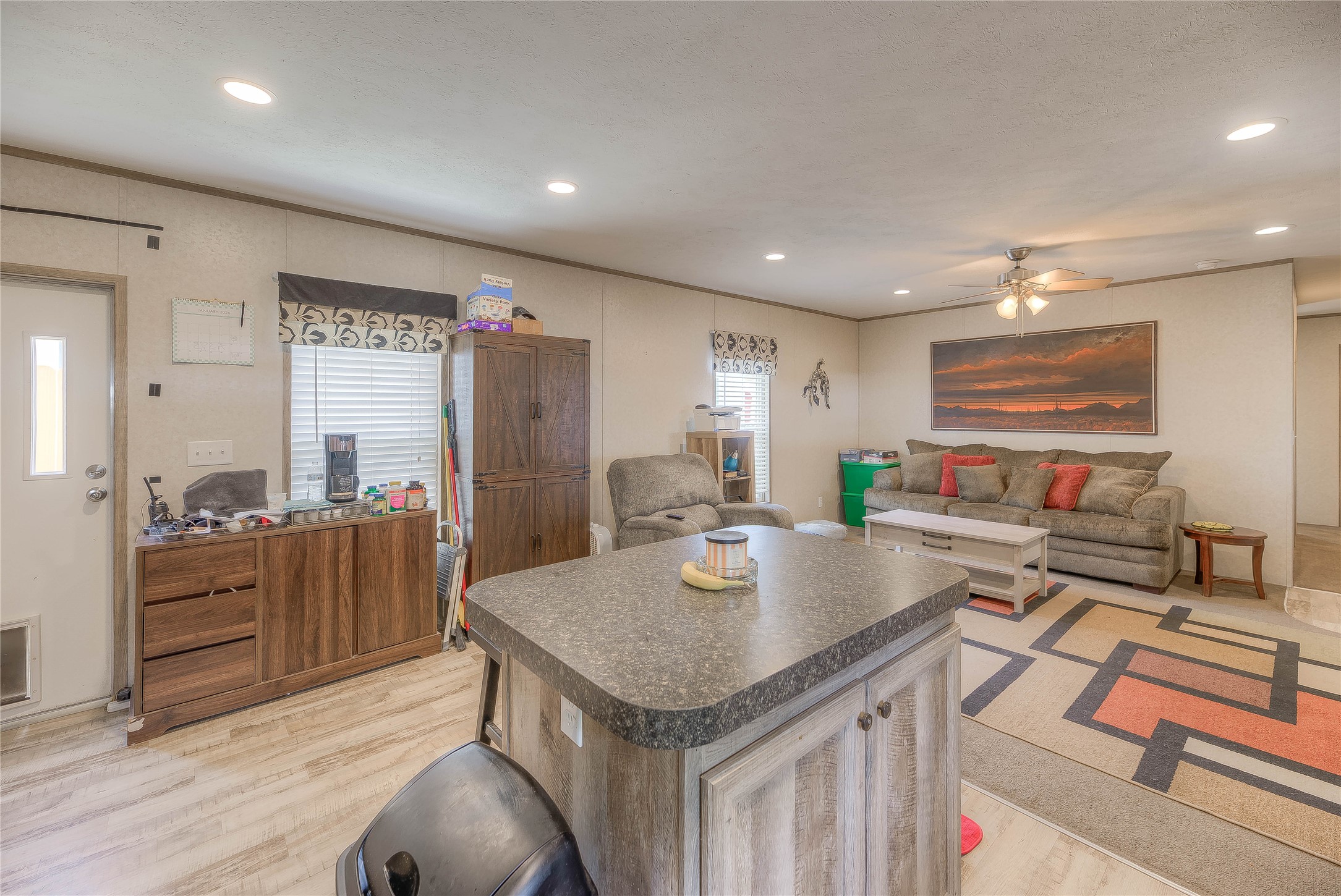 138 Pecan Onalaska, TX 77360 - Photo 5 of 33 a open kitchen with stainless steel appliances granite countertop a stove and a kitchen island
