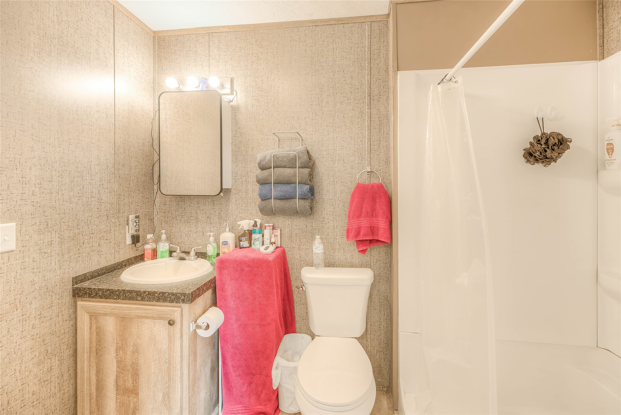 138 Pecan Onalaska, TX 77360 - Photo 9 of 33 a bathroom with a sink toilet and shower