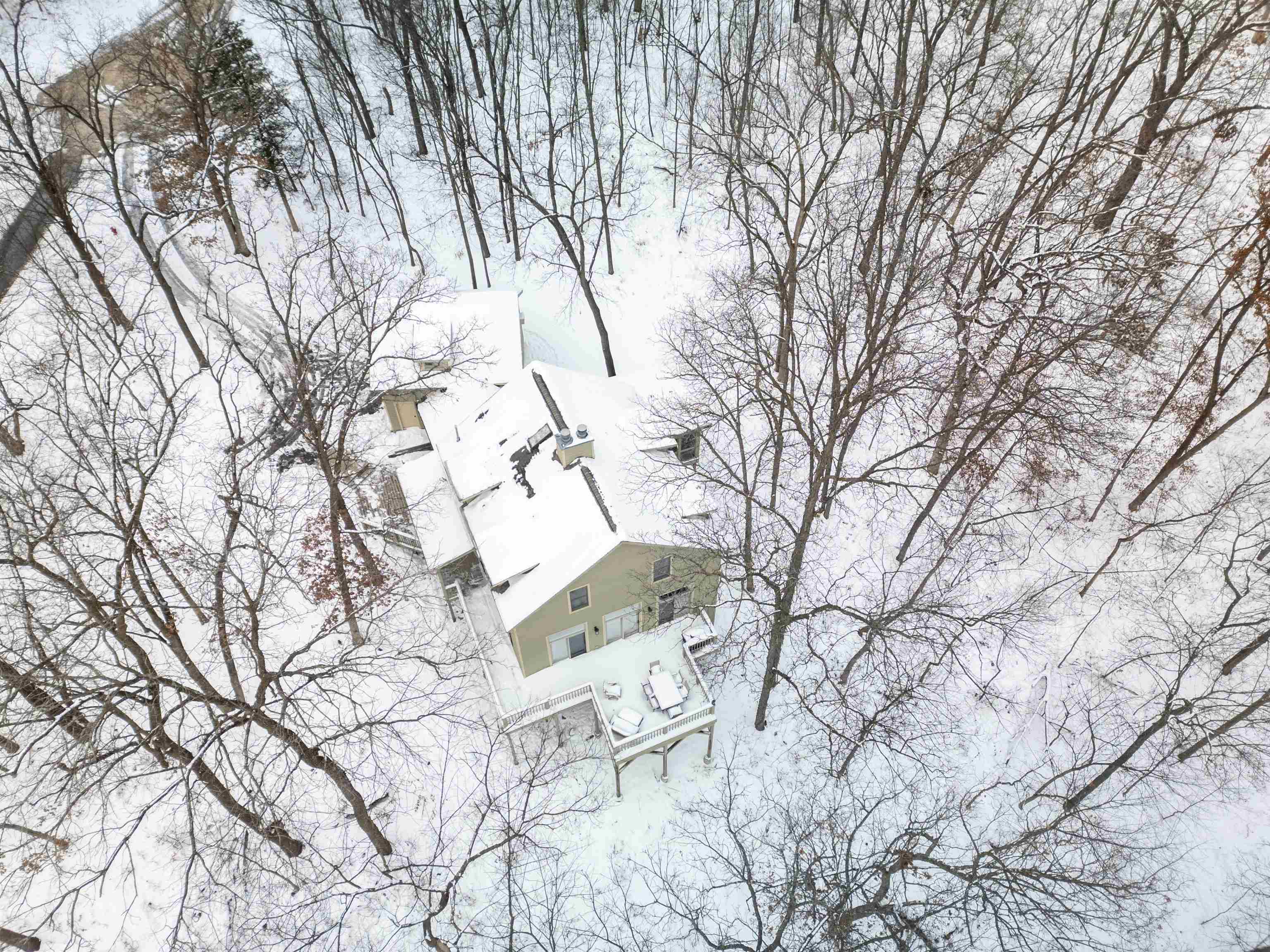 2 Canton Court Galena, IL 61036 - Photo 21 of 37 a backyard of a house with lots of trees