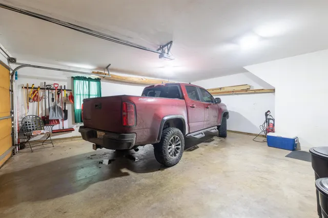 a bedroom with furniture and a bed
