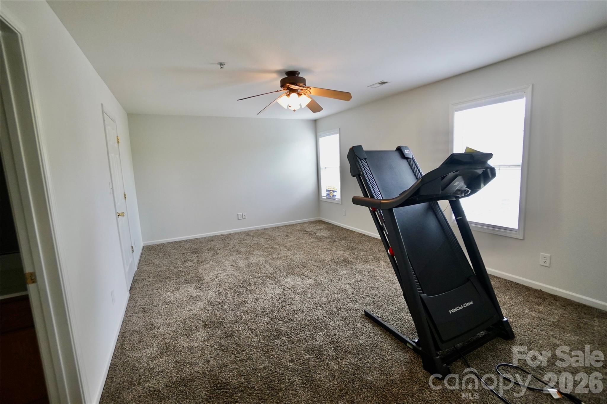 4010 Town Center Road Harrisburg, NC 28075 - Photo 7 of 17 a room with furniture and a window