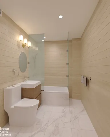 a bedroom with a bed and a lamp