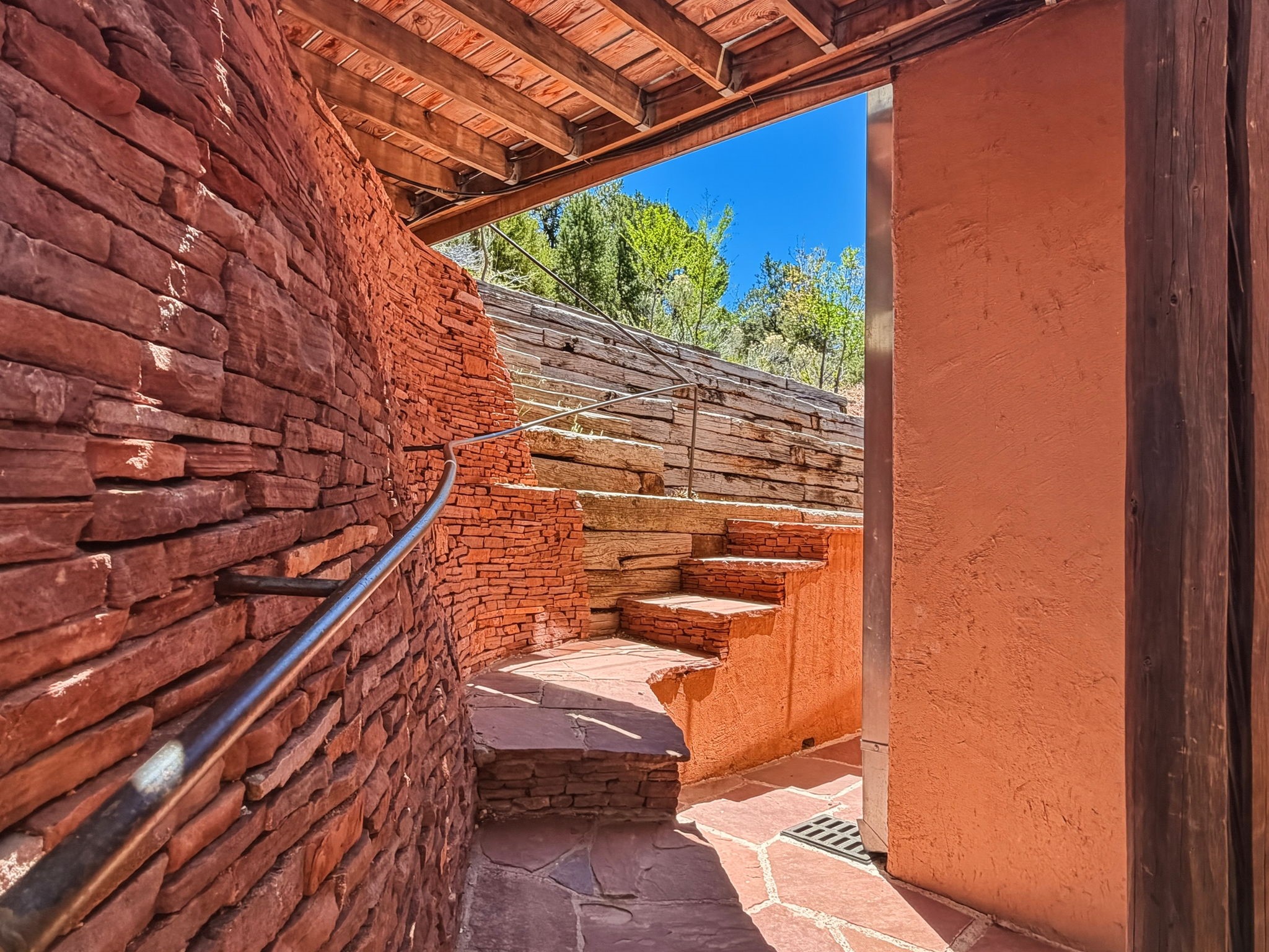 1692 Upper Canyon Road Santa Fe, NM 87501 - Photo 33 of 52 Anasazi-inspired wall with ascending stairs leading to a private elevated retreat.