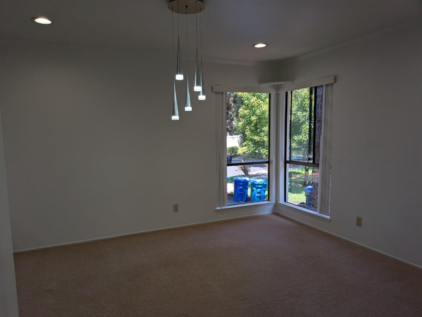 217 Ada Avenue, Unit 45 Mountain View, CA 94043 - Photo 25 of 43 a view of an empty room with a window