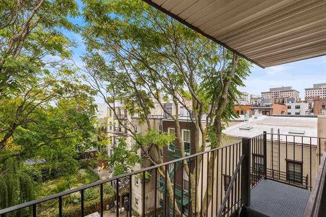 208 1st Street, Unit 5B Hoboken, NJ 07030 - Photo 9 of 11 a view of a building from a balcony