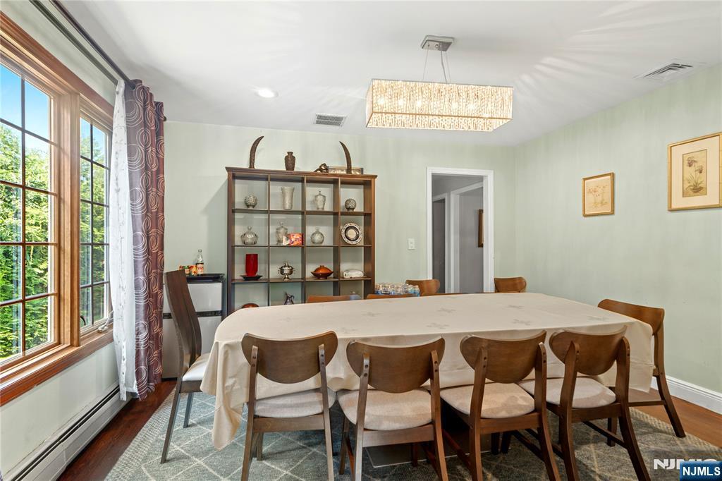 10 East Allendale Road Saddle River, NJ 07458 - Photo 7 of 10 a view of a dining room with furniture and window