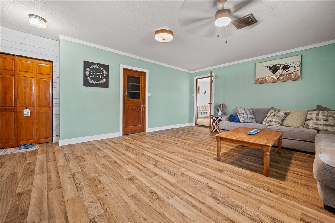 14534 Cr 756 Road Sinton, TX 78387 - Photo 10 of 23 living area. Laundry behind wooden door on the rig