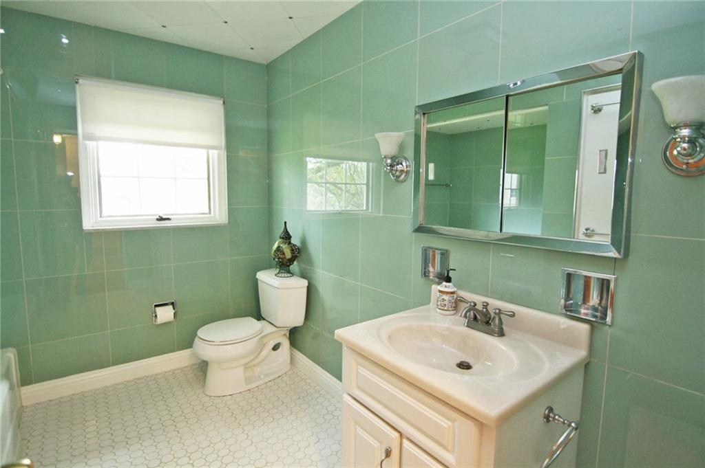 105 Center Church Road Canonsburg, PA 15317 - Photo 16 of 25 Spacious...Spacious with Carrara glass tile walls and ceiling...two sconce style wall lamps and tub/shower combination!