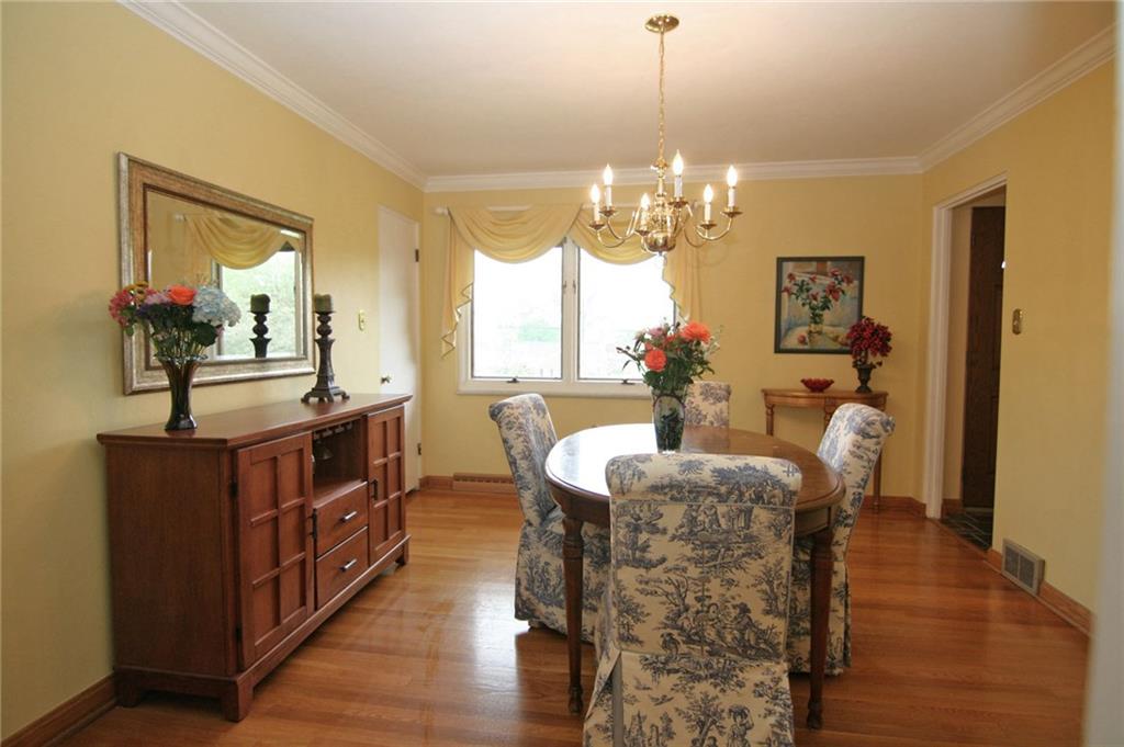 105 Center Church Road Canonsburg, PA 15317 - Photo 8 of 25 Bedroom #3 currently used as a dining room...crown molding, attractive chandelier and double window...perfect for dinner parties, holidays as well as everyday family dining...