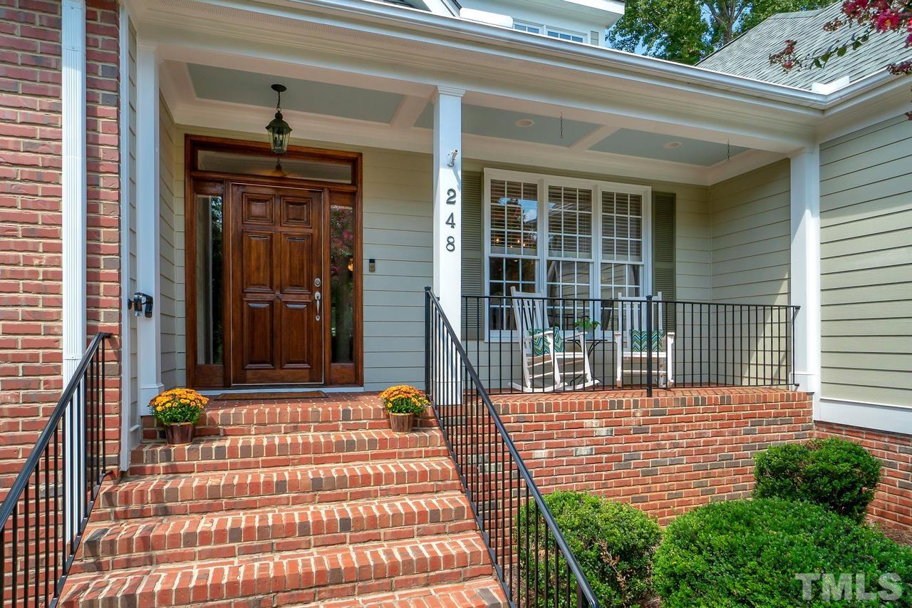 248 Waterville Street Raleigh, NC 27603 - Photo 2 of 30 a front view of a house with a porch