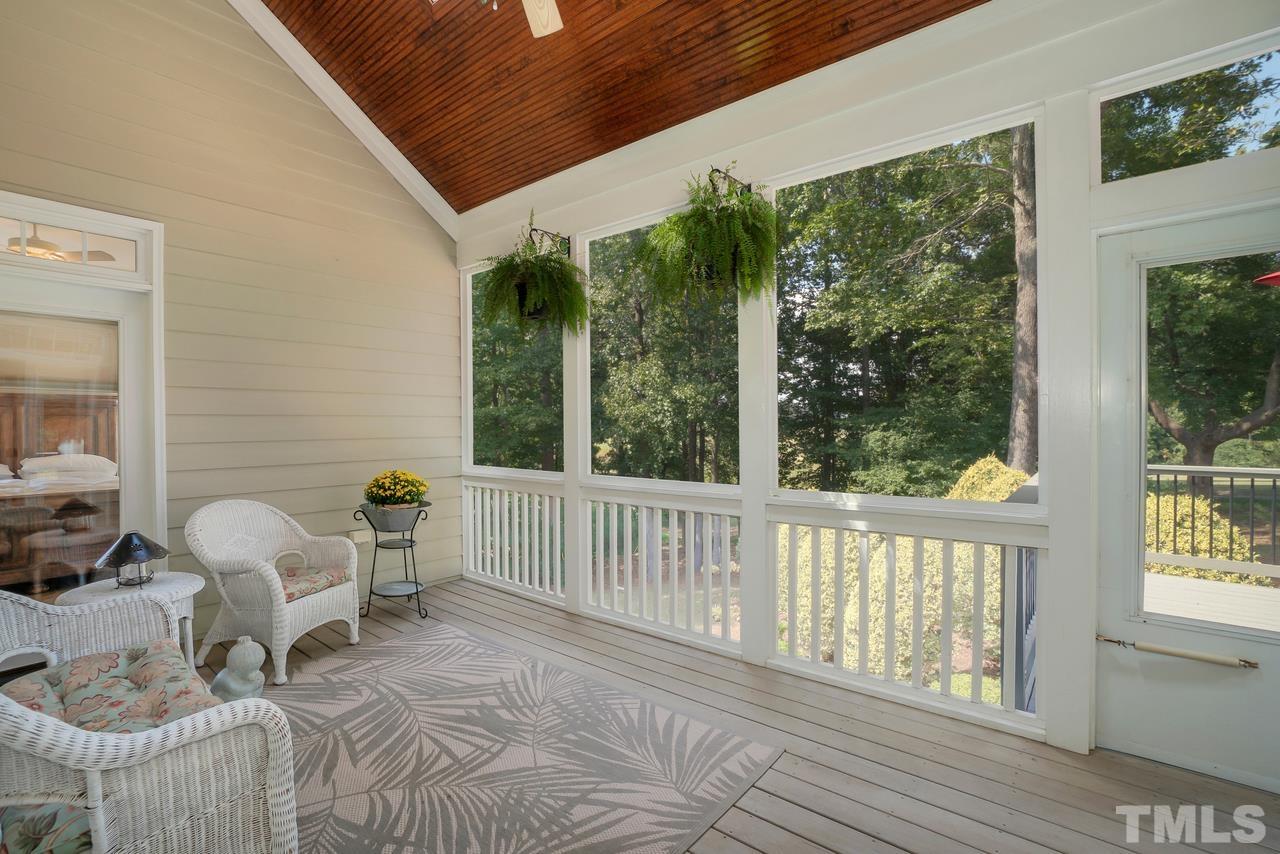 248 Waterville Street Raleigh, NC 27603 - Photo 16 of 30 a view of a two chair in the balcony
