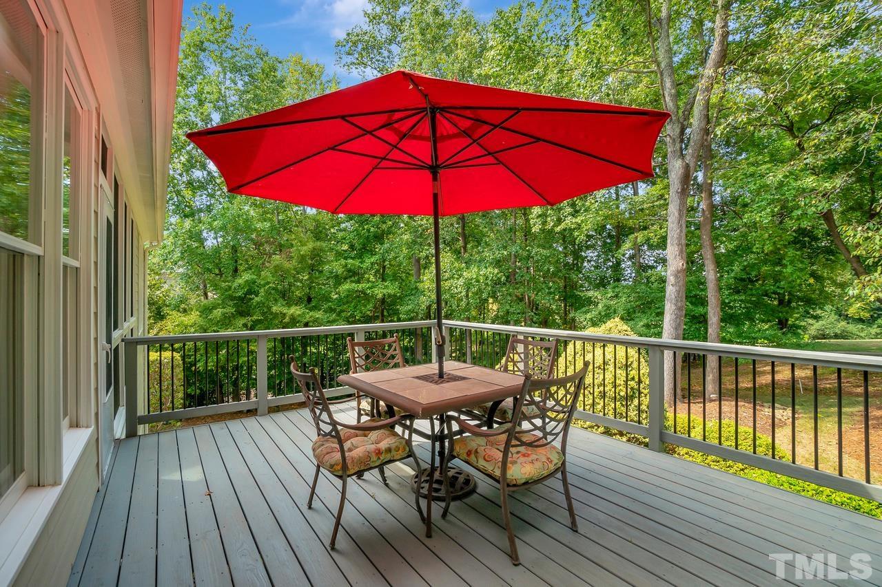 248 Waterville Street Raleigh, NC 27603 - Photo 17 of 30 a view of a chair and table on the deck