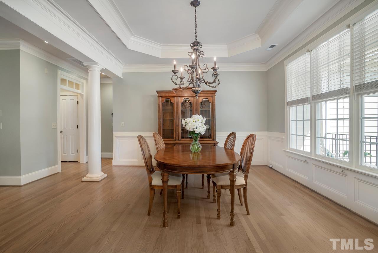 248 Waterville Street Raleigh, NC 27603 - Photo 3 of 30 a view of a dining room with furniture window and wooden floor