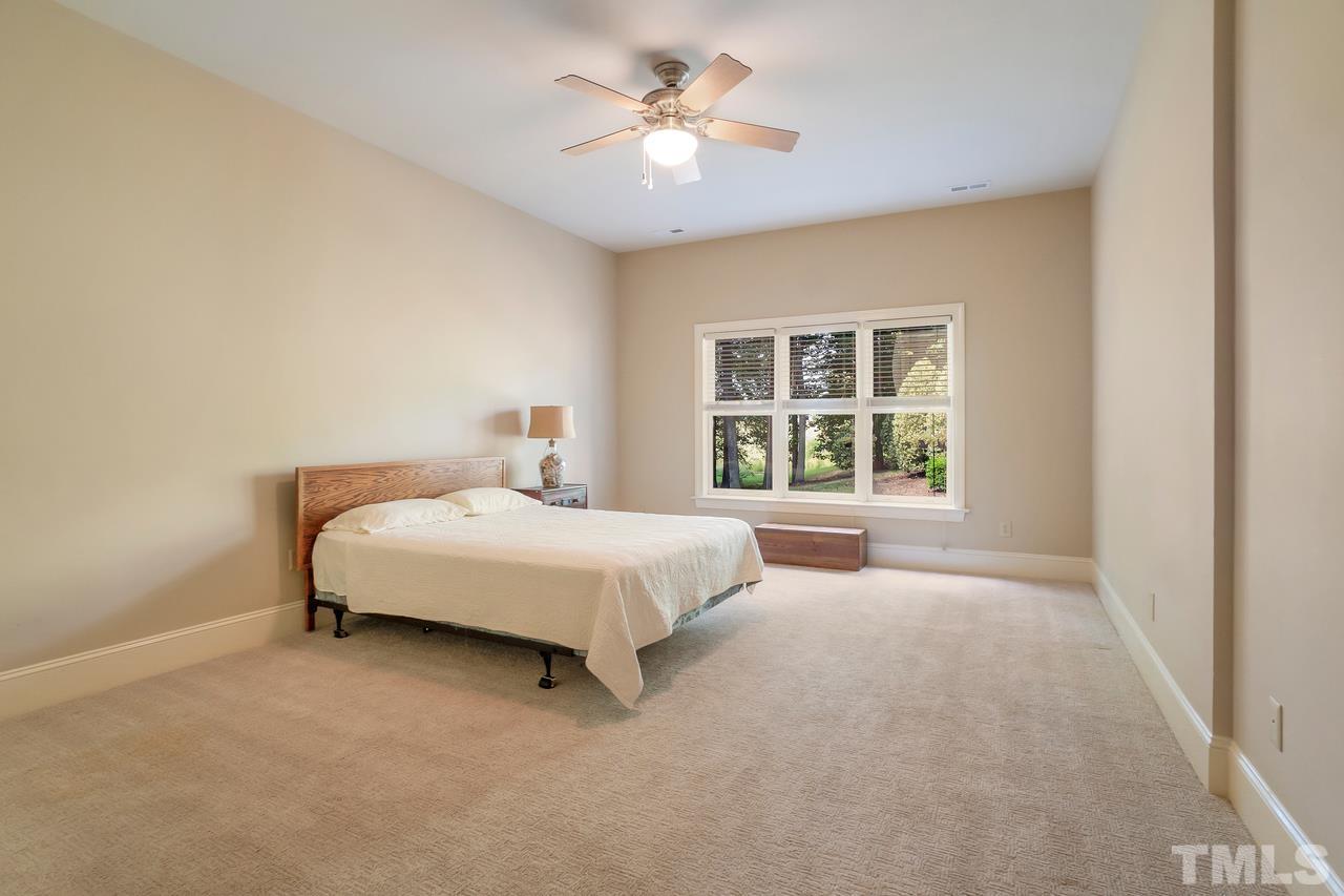 248 Waterville Street Raleigh, NC 27603 - Photo 22 of 30 a bedroom with a bed and a window