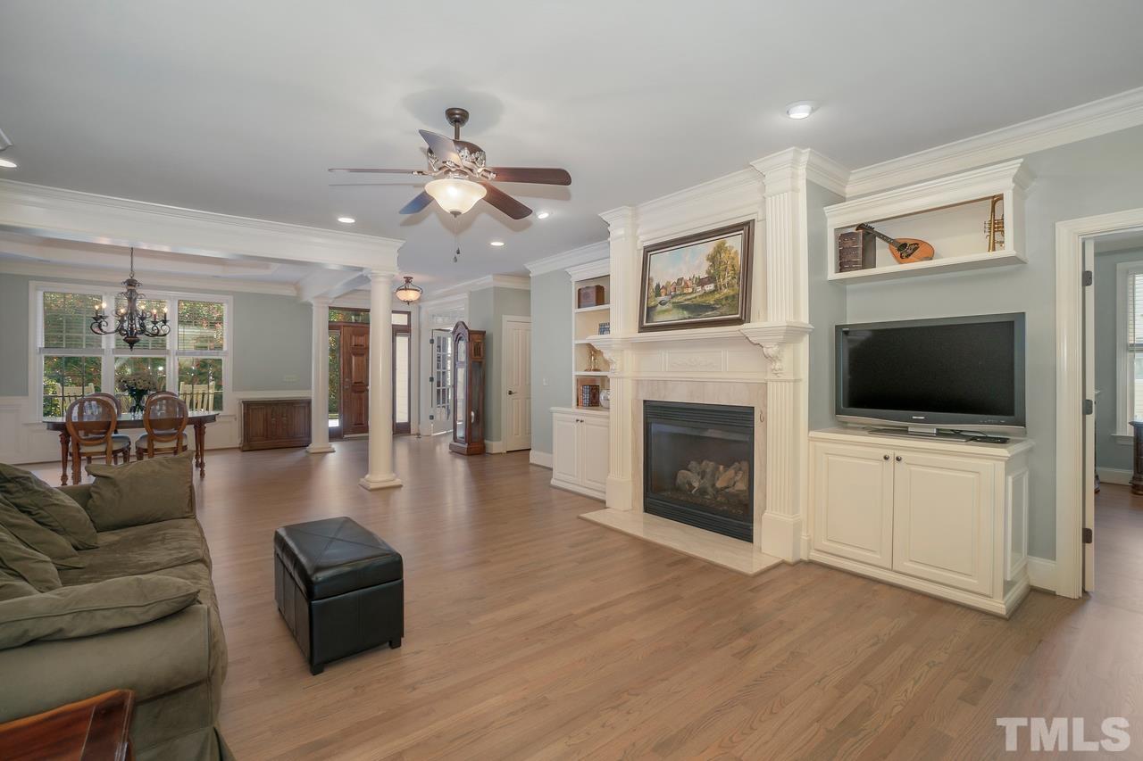 248 Waterville Street Raleigh, NC 27603 - Photo 5 of 30 a living room with furniture fireplace and flat screen tv