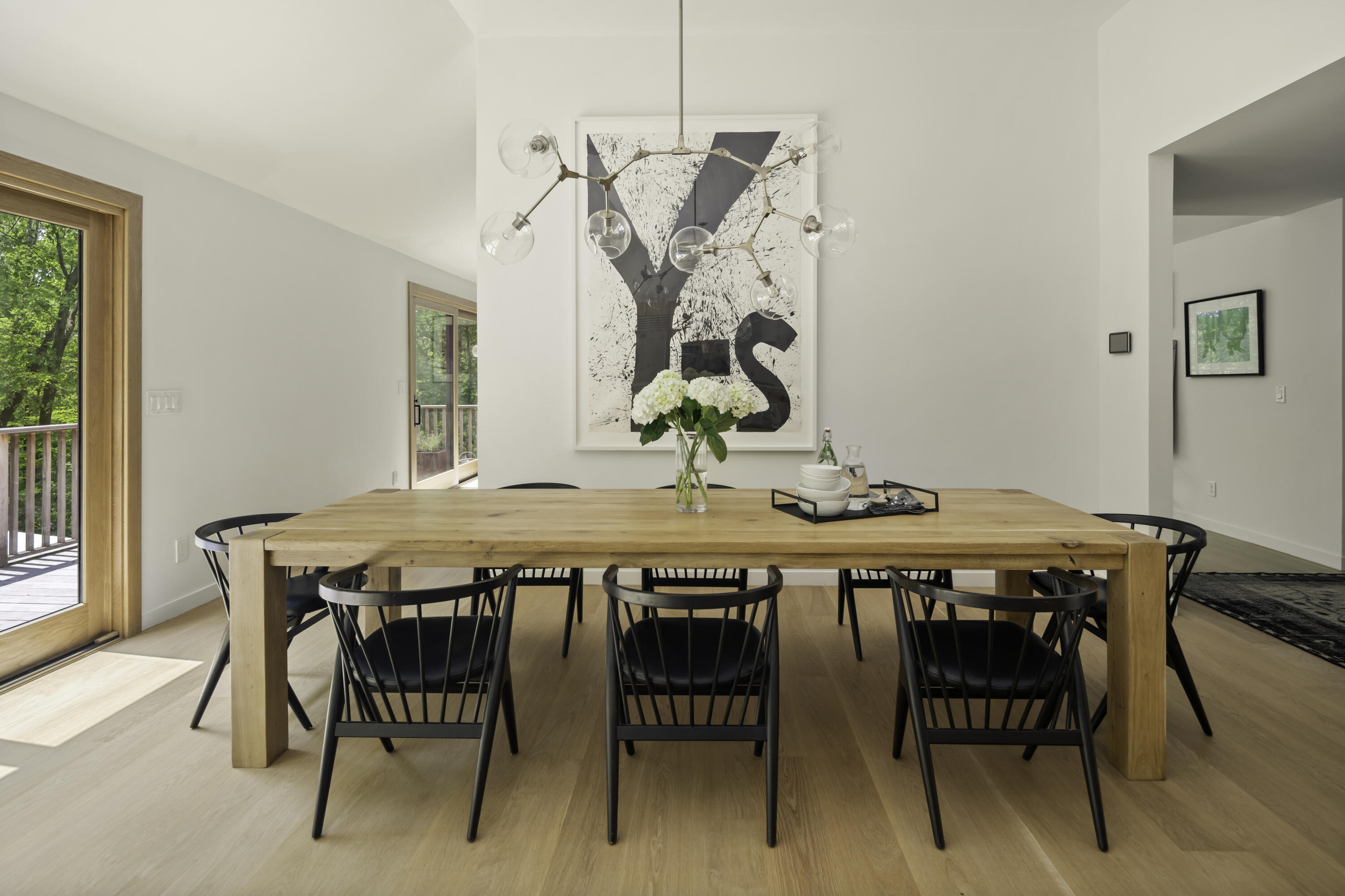 86 Logan Road New Canaan, CT 06840 - Photo 11 of 38 a dining room with a table and chairs