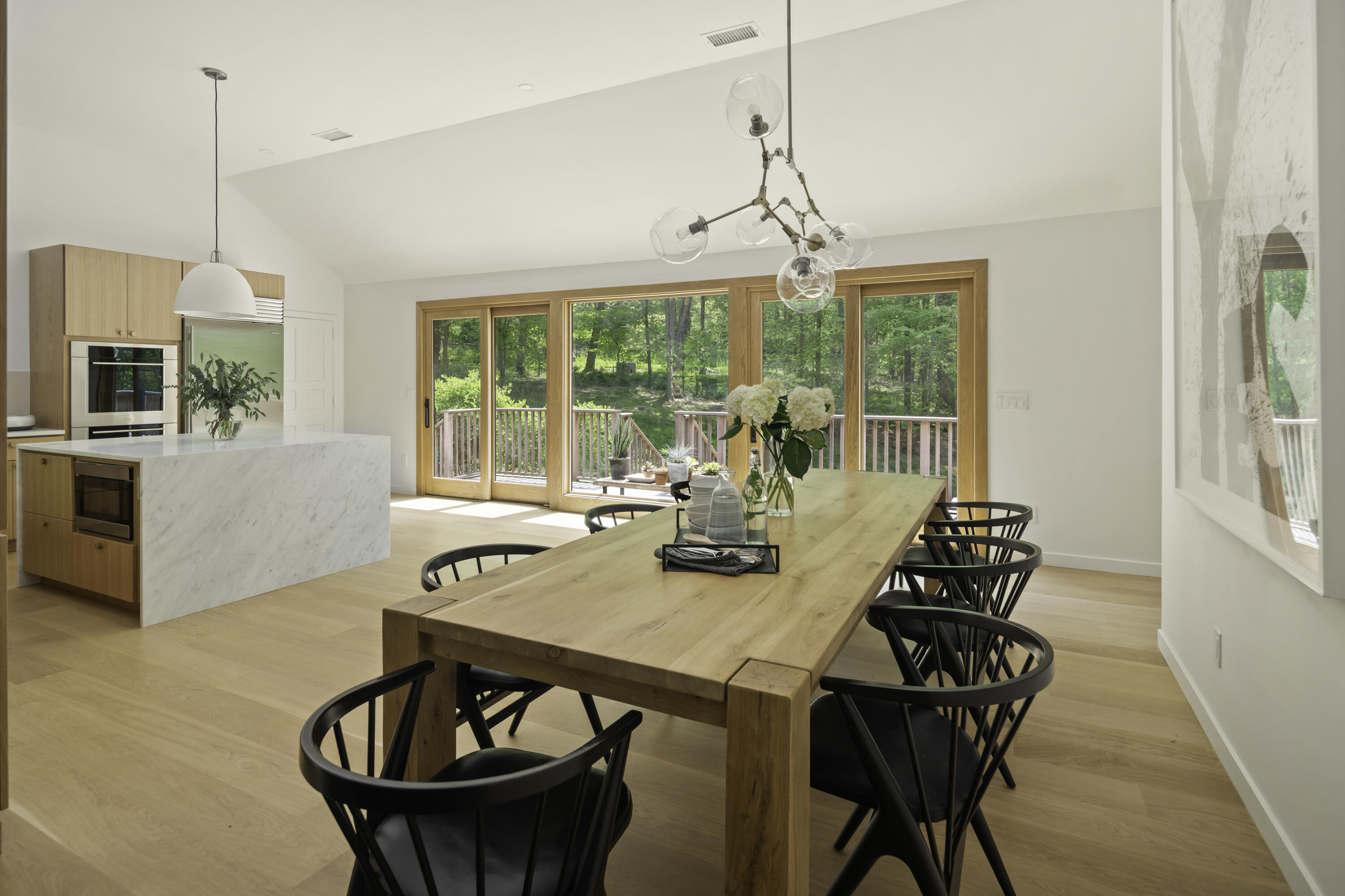 86 Logan Road New Canaan, CT 06840 - Photo 12 of 38 a view of a dining room with furniture window and outside view