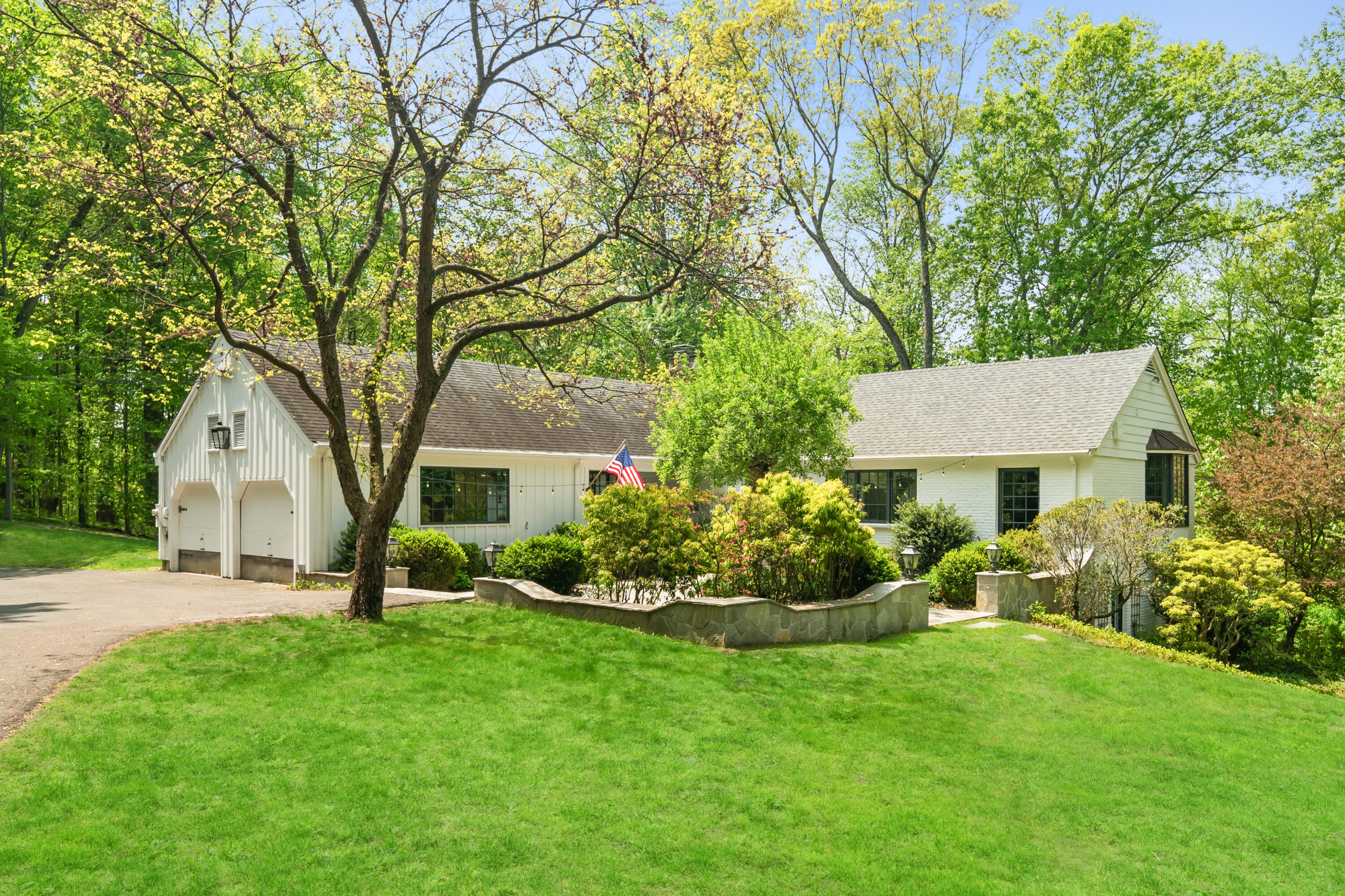 86 Logan Road New Canaan, CT 06840 - Photo 2 of 38 a view of a house with backyard and garden