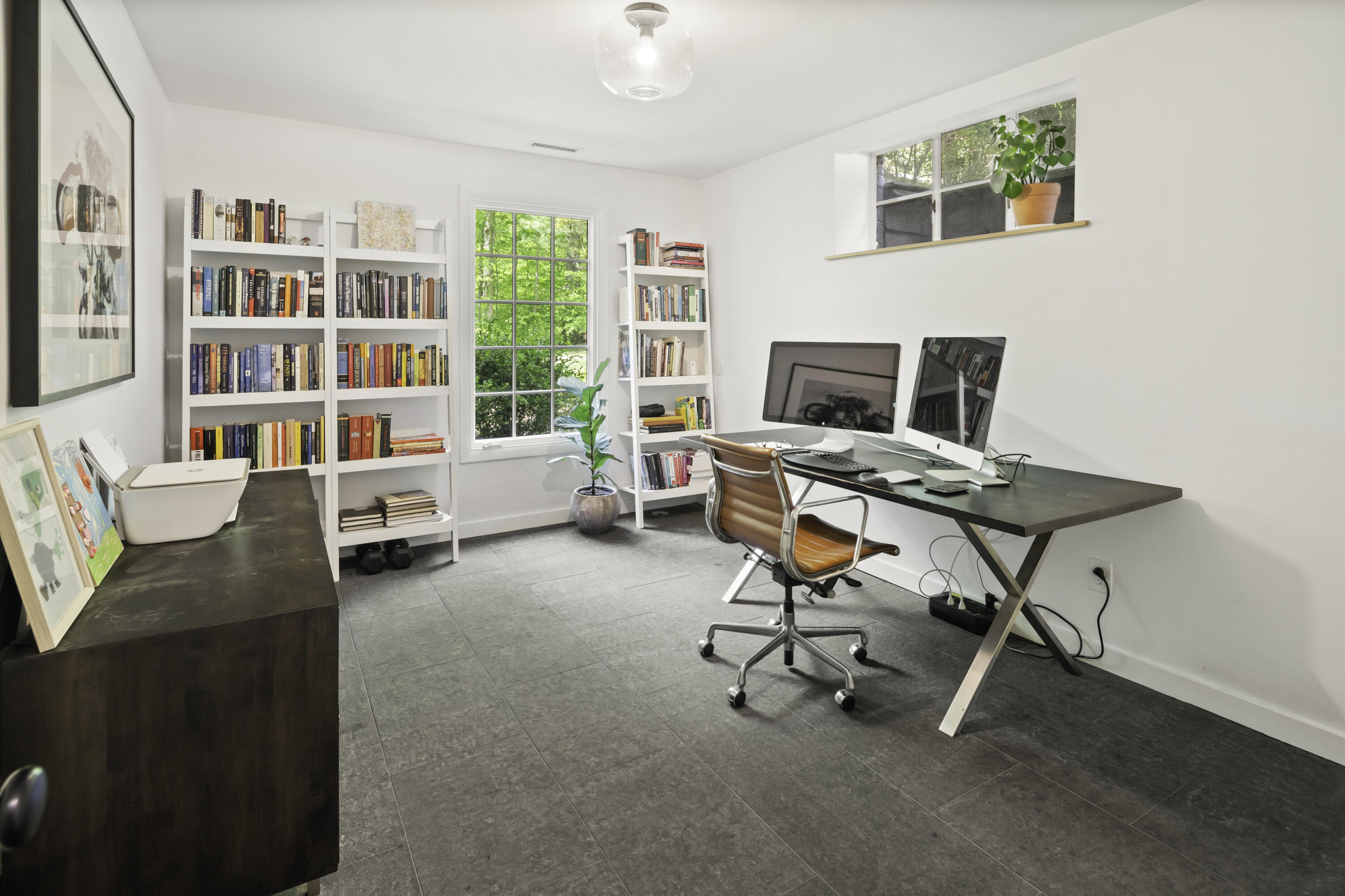 86 Logan Road New Canaan, CT 06840 - Photo 27 of 38 a workspace with a bookshelf