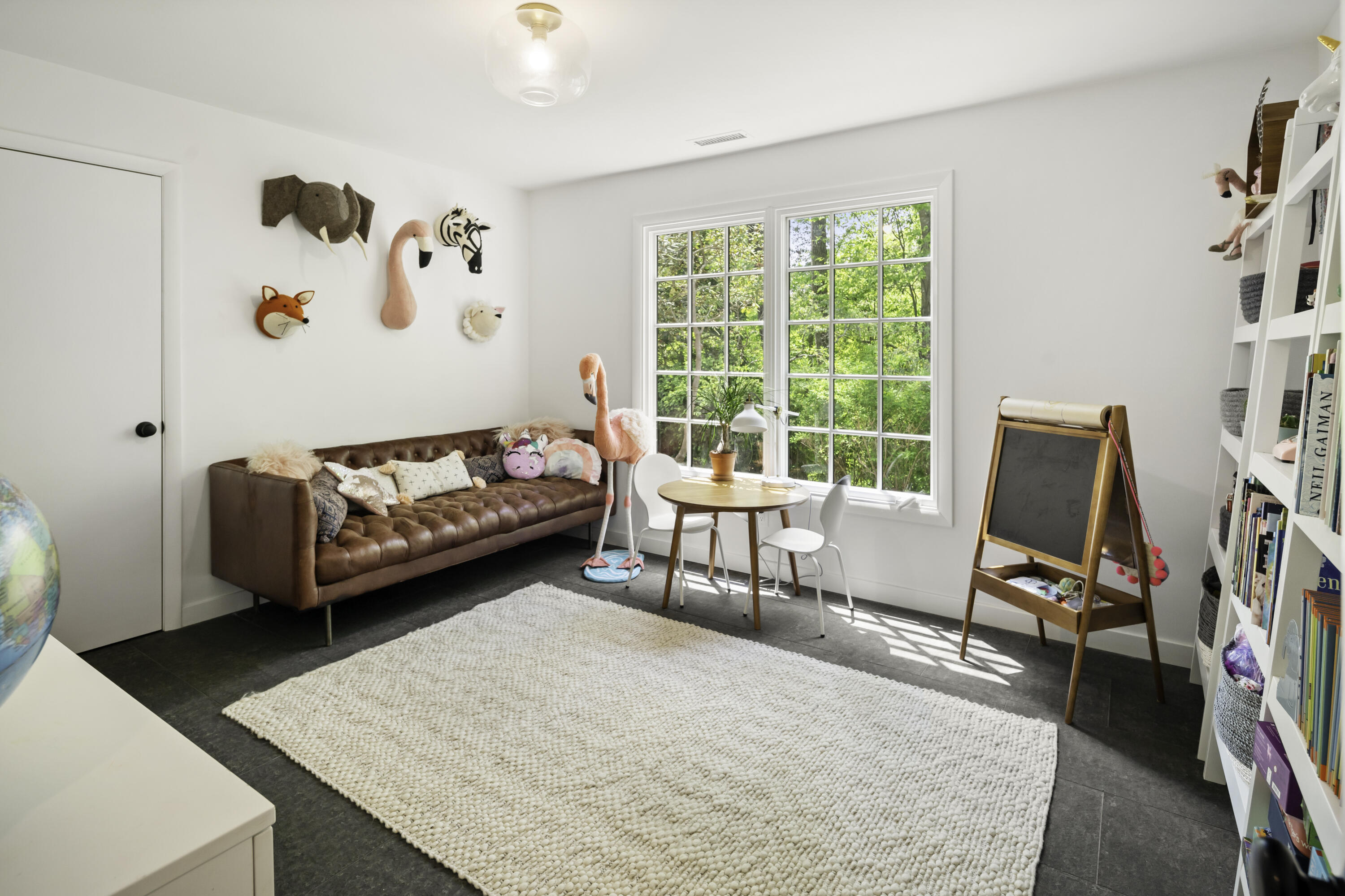 86 Logan Road New Canaan, CT 06840 - Photo 29 of 38 a living room with furniture and a window
