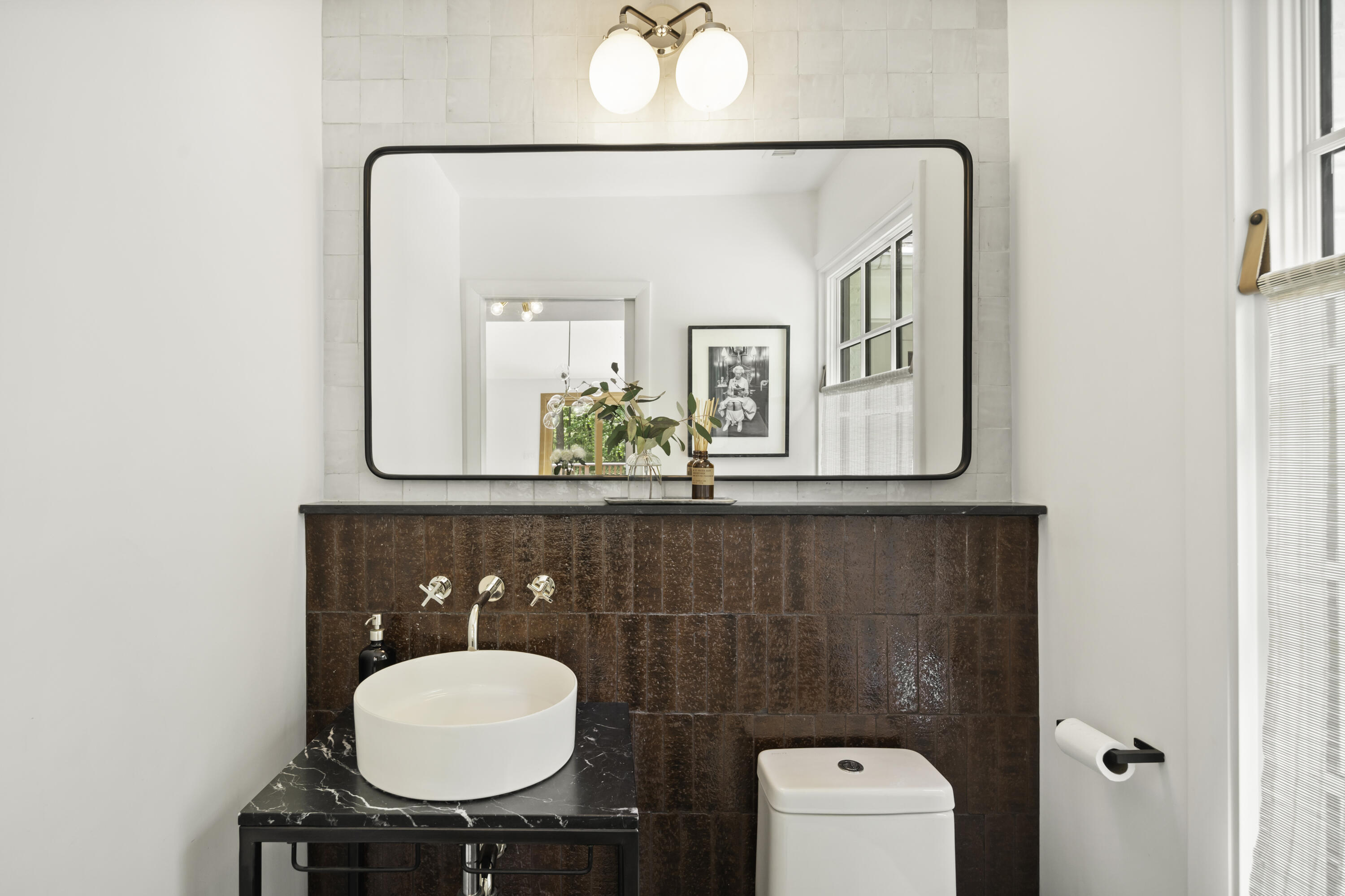 86 Logan Road New Canaan, CT 06840 - Photo 7 of 38 a bathroom with a toilet a sink and mirror