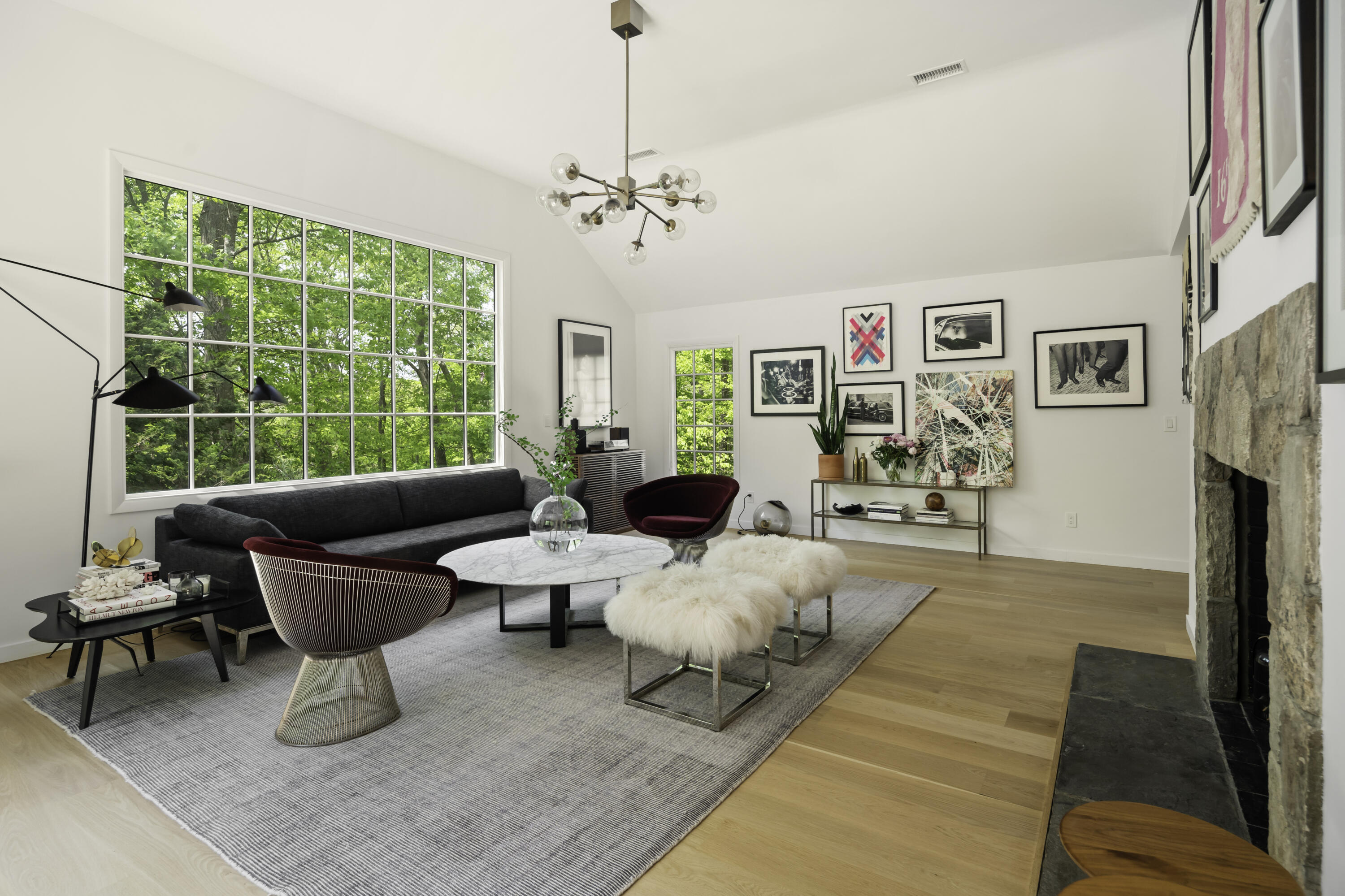 86 Logan Road New Canaan, CT 06840 - Photo 9 of 38 a living room with furniture large window and a table
