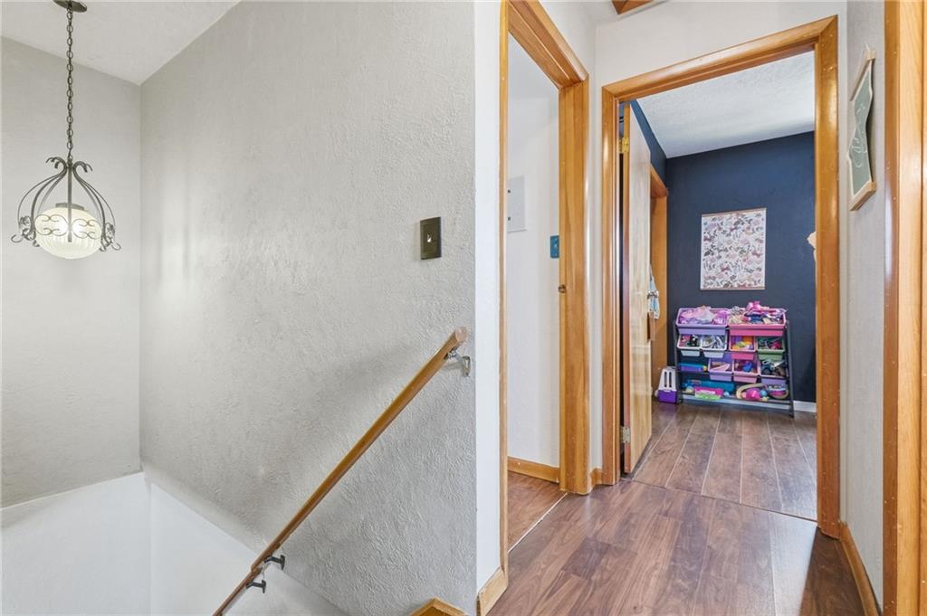 106 Logan Street Pittsburgh, PA 15209 - Photo 17 of 40 a view of a hallway to a livingroom with furniture