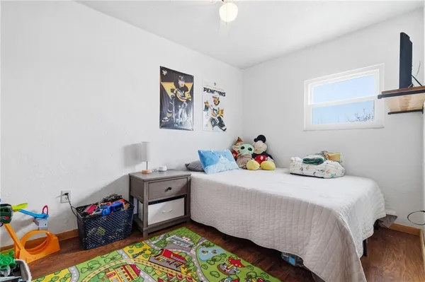 a bedroom with lots of baby toys