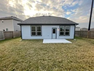 a house with trees in the background
