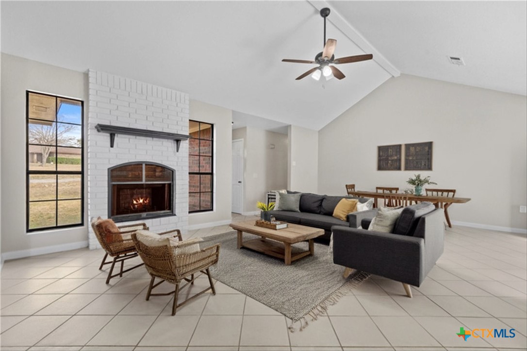 180 County Road 4933 Kempner, TX 76539 - Photo 6 of 24 a living room with furniture and a fireplace