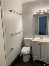3324 Meadowbridge Road Richmond, VA 23222 - Photo 21 of 38 a bathroom with a sink a toilet and shower