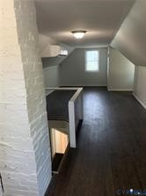 3324 Meadowbridge Road Richmond, VA 23222 - Photo 30 of 38 an empty room with wooden floor and windows