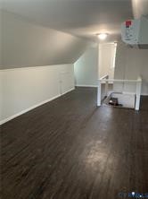 3324 Meadowbridge Road Richmond, VA 23222 - Photo 31 of 38 an empty room with wooden floor and windows
