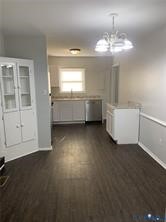 3324 Meadowbridge Road Richmond, VA 23222 - Photo 7 of 38 a living room with furniture and a chandelier