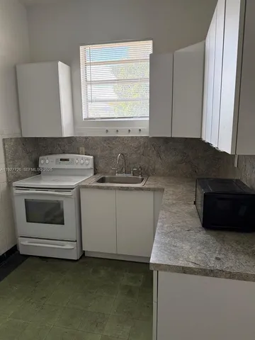 a view of an empty room with window