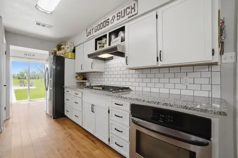 $375,000 | 1858 County Road 2066, Hull, TX 77564