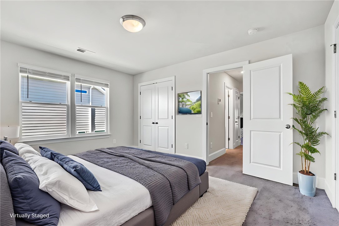 142 Juniper Hill Drive Easley, SC 29642 - Photo 38 of 47 This bright and airy room offers a comfortable and serene retreat.