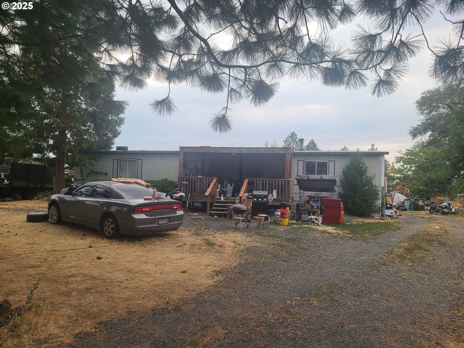 71618 Charolais Street Pendleton, OR 97801 - Photo 1 of 1 a car parked in front of a house