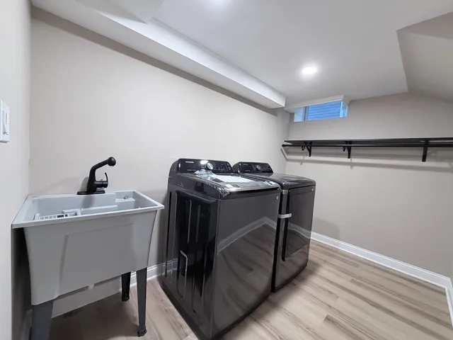 a utility room with washer and dryer