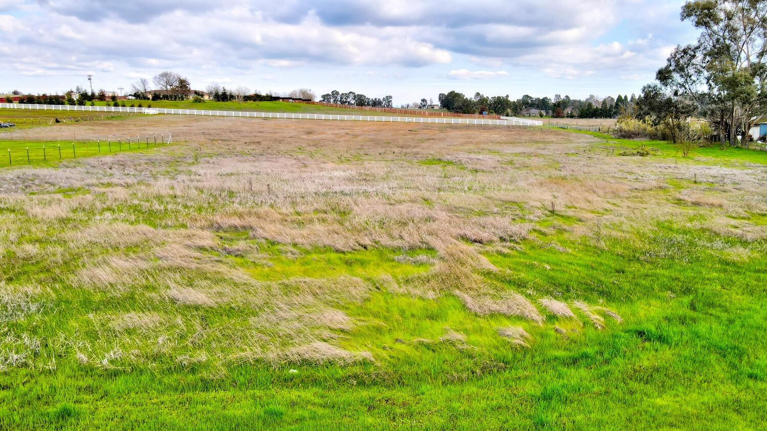 0 Colony Road Wilton, CA 95693 - Photo 26 of 28 a view of a lake with houses in the back